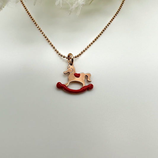 Collana cavalluccio a dondolo rosso - Rosè