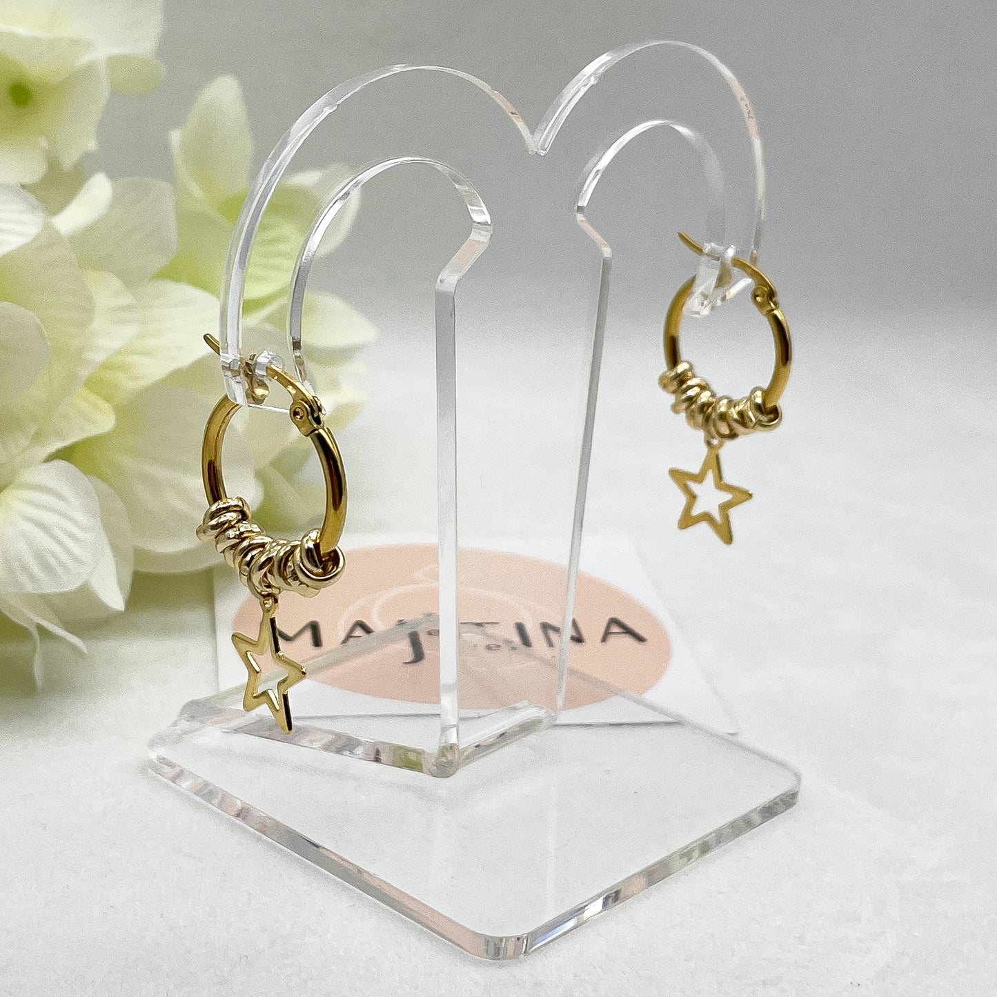 Orecchini cerchi intreccio e stellina - Gold