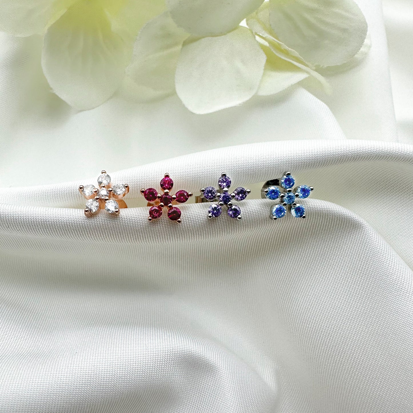 Orecchini fiore zirconi azzurri - Silver