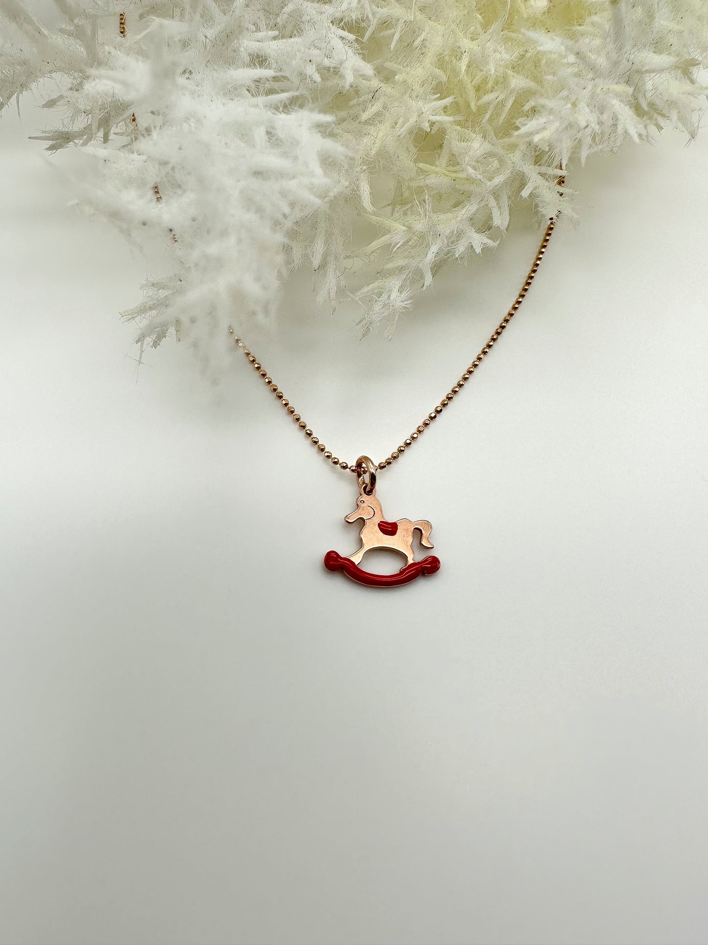 Collana cavalluccio a dondolo rosso - Rosè