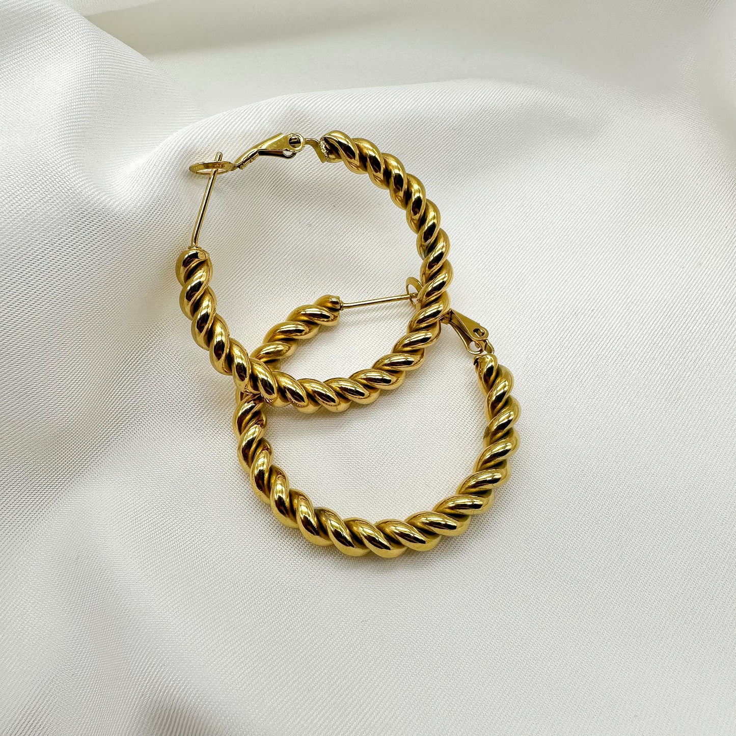 Orecchini cerchi effetto ritorto - Gold